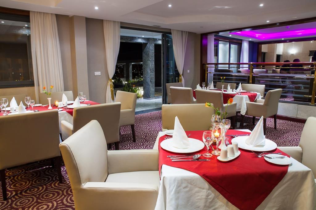Grand Legacy Hotel Кигали Экстерьер фото
