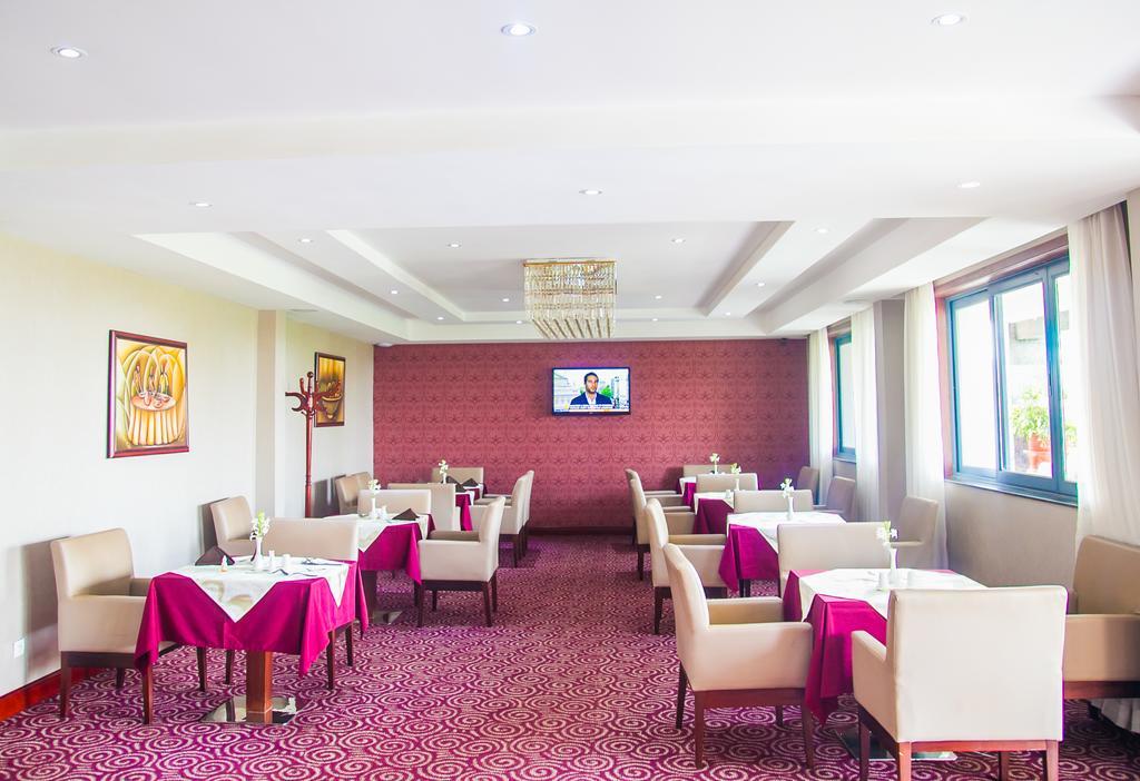 Grand Legacy Hotel Кигали Экстерьер фото