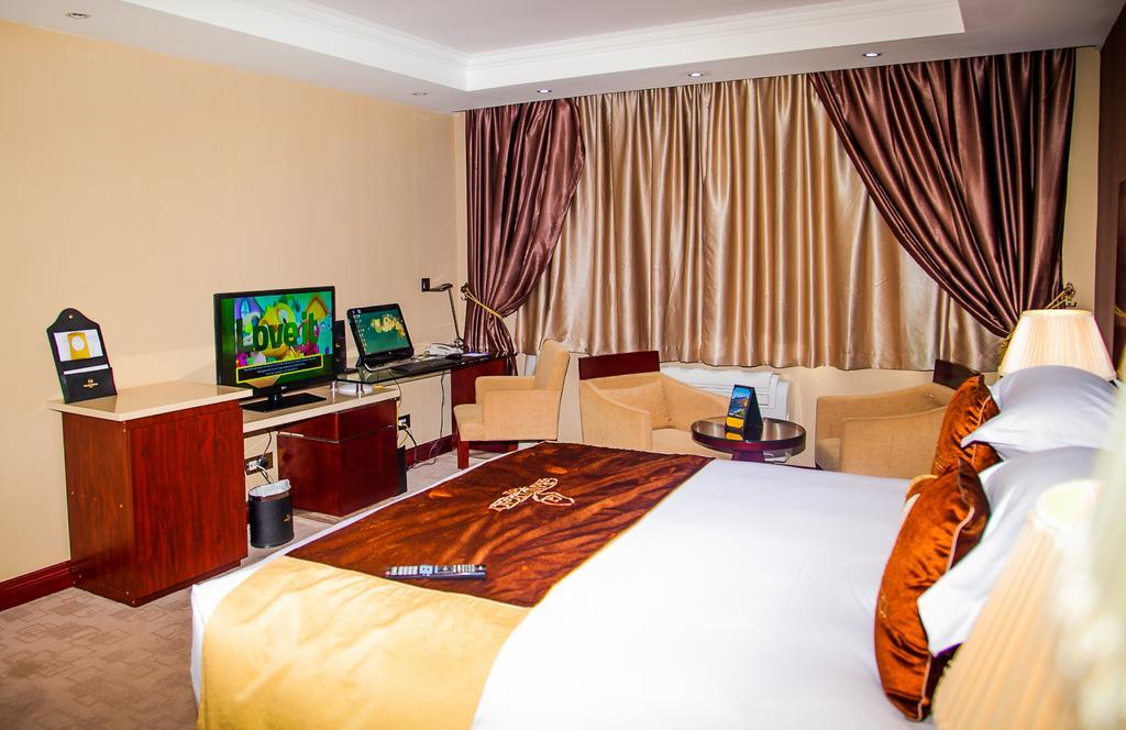 Grand Legacy Hotel Кигали Экстерьер фото